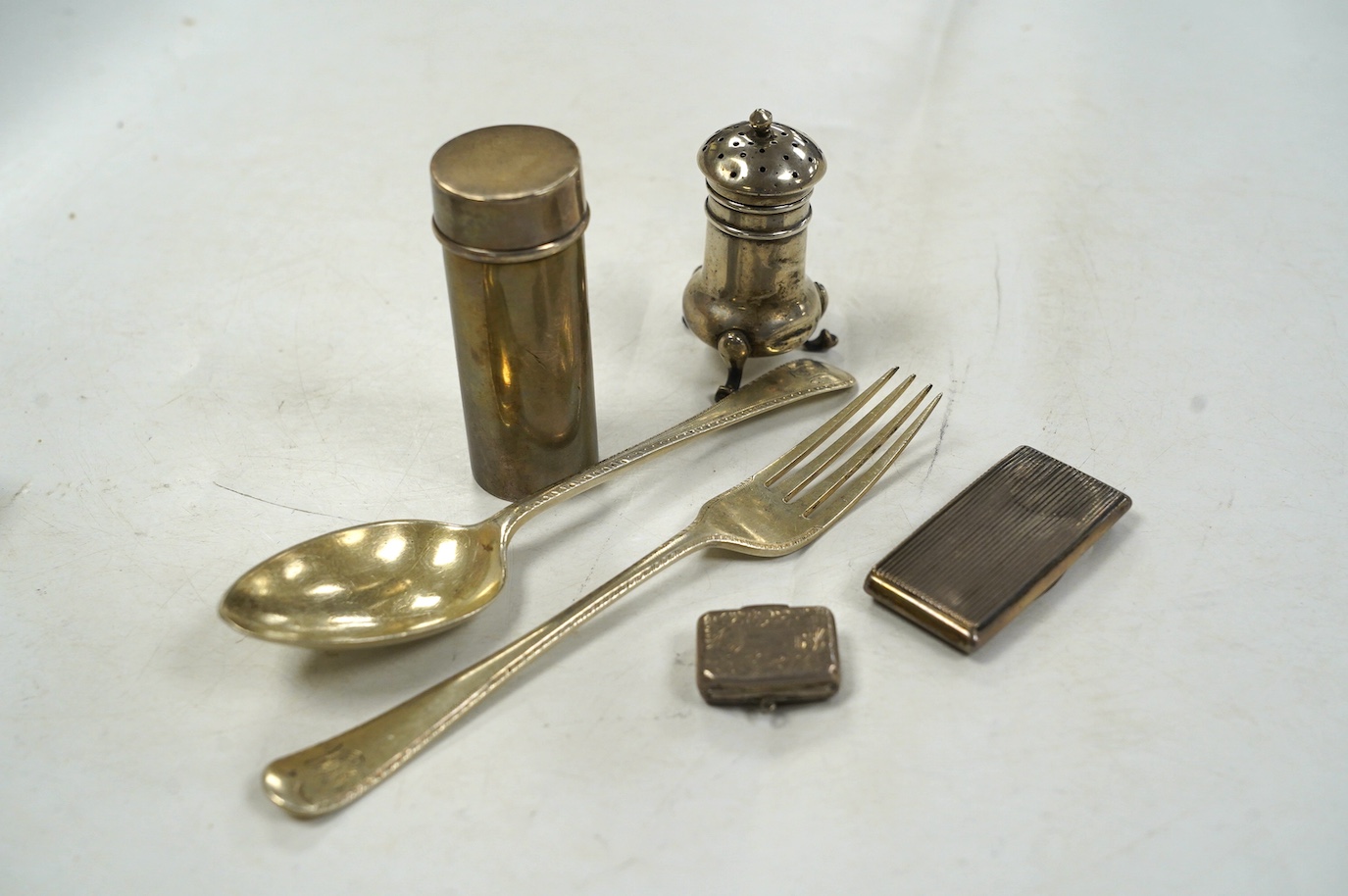 A group of small silver, including a George IV vinaigrette, shaving brush holder, etc. and a Dutch white metal snuff box. Condition - poor to fair